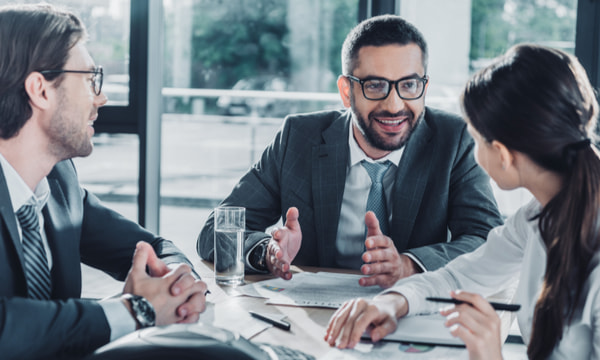 Confident business people having conversation