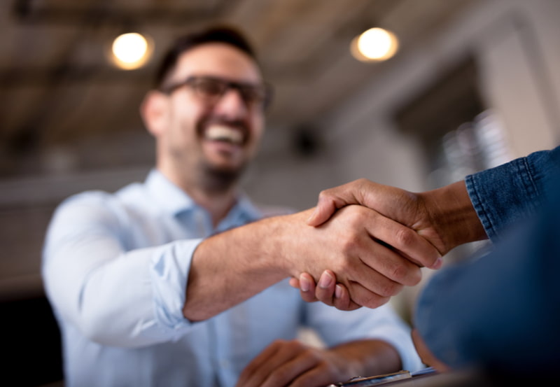 Business people shaking hands